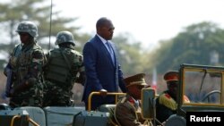 FILE - Burundi's President Pierre Nkurunziza arrives for the celebrations to mark Burundi's 55th anniversary of independence at the Prince Louis Rwagasore stadium in Bujumbura, Burundi, July 1, 2017.
