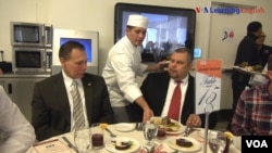 Isidro Dubon Serving at Carlos Rosario Achieving the Dream Luncheon