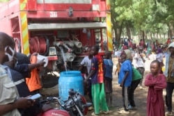 Cameroonians who fled deadly intercommunal violence in between Arab Choa herders and Mousgoum and Massa farming communities are seen at a temporary refugee camp in Farcha district, N'djamena, Chad, Dec. 9, 2021.