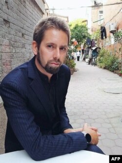 This undated photo at an undisclosed location provided to AFP by the 'Chinese Urgent Action Working Group' shows Swedish human rights activist Peter Dahlin.