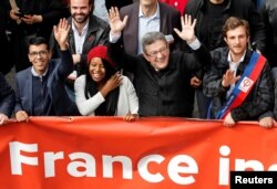 FILE - Jean-Luc Melenchon, leader of far-left opposition "France Insoumise" (France Unbowed) political party attends a demonstration against French government reforms in Marseille, France, Apr. 14, 2018.