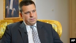 FILE - Estonian Prime Minister Juri Ratas answers questions by The Associated Press during an interview in Estonia’s capital,Tallinn, June 2, 2017.