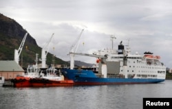 FILE - View of the harbor of Port Louis on the Indian Ocean island of Mauritius, Aug. 5, 2015.