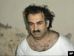 FILE - A photo of alleged Sep 11, 2001 mastermind Khalid Sheikh Mohammed soon after he was arrested.