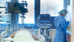 Medical staff attend to a patient at the COVID-19 ICU unit of the hospital in Bratislava, Slovakia, Nov. 23, 2021.