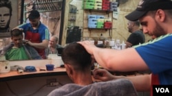 Despite the many restrictions on their right to work, many Palestinians find a way to earn a living. Dependency on the UNRWA - the UN’s agency focused on supporting Palestinian refugees - remains high, however. (J. Owens/VOA)