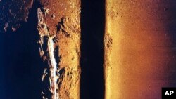 A high frequency sonar image of the flagship Japanese aircraft carrier Akagi is shown aboard the research vessel Petrel on Sunday, Oct. 20, 2019 off Midway Atoll in the Northwestern Hawaiian Islands. (AP Photo/Caleb Jones)