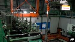 This image released by Tokyo Electric Power Co. (TEPCO) shows the operation floor above a cooling pool at Unit 3 of the Fukushima nuclear power plant in Okuma town, Fukushima prefecture, northeastern Japan, Monday, April 15, 2019. (Tokyo Electric Power Co