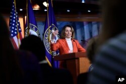 FILE - House Minority Leader Nancy Pelosi of Calif., speaks during a news conference on Capitol Hill in Washington, Nov. 15, 2018.