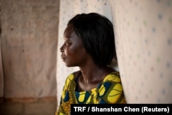 Paska Akello sits in her house in Wilpii village, Paicho sub-county, Gulu district in Northern Uganda, March 26, 2018.
