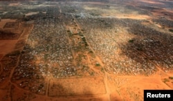 FILE - An aerial view shows makeshift shelters at the Dagahaley camp in Dadaab, near the Kenya-Somalia border in Garissa County, Kenya.