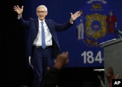 FILE - Wisconsin Democratic candidate for governor Tony Evers speaks at a rally in Milwaukee, Oct. 26, 2018. Evers won and is Wisconsin's governor.