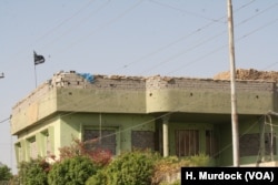Bullet holes riddle Peshmerga base after at least five hours of fighting from Friday nigh to Saturday morning on Oct. 14, 2017, in Tuz Khurmatu, Iraq.