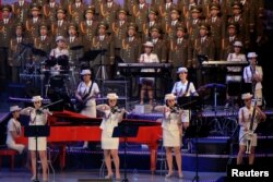 FILE PHOTO: The Moranbong Band, an all-female North Korean pop band formed by leader Kim Jong Un, performs at a celebratory concert marking the end of the 7th Workers' Party Congress in Pyongyang, North Korea May 11, 2016.