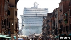 FILE - The MSC Divina cruise ship is seen in Venice lagoon, June 16, 2012.