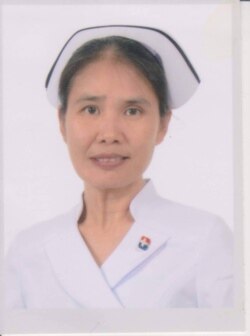 Anchalee Dulayathitikul, a Thai nurse in Maryland, received the first shot of Covid-19 vaccine in December.