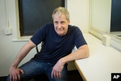 FILE - Jeff Daniels sits backstage at the Belasco Theatre in New York, where he stars with Michelle Williams in "Blackbird," an often brutal drama about an illegal relationship. Both actors and the play received Tony nominations.