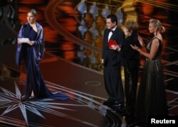 Best Foreign Language Film The Salesman Asghar Farhadi (Iran) is accepted by a designated woman reading Farhadi's statement.