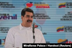 Venezuela's President Nicolas Maduro attends an event with supporters in Caracas, Venezuela, Nov. 13, 2018.