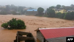 This picture shows flooded streets in Regent near Freetown, Aug. 14, 2017.