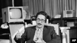 FILE - Then-Iranian President Abolhassen Bani-Sadr seen during a press conference, Dec. 1980 in Tehran.