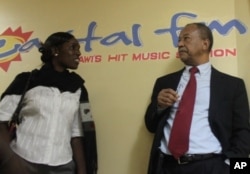 Capital FM owner Alaudin Osman and sub-editor Chikondi Juma in Blantyre, Malawi