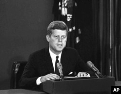 President John F. Kennedy makes a national television speech October 22, 1962, from Washington. He announced a naval blockade of Cuba until Soviet missiles are removed. (AP Photo)