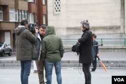 Reporters comb Molenbeek, seeking to find out why this seemingly nondescript area has a disproportionate amount of extremists. Some locals say the intense negative attention being paid to the area is contributing to the problem, March 25, 2016. (H.Murdock