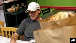 David Feldstein, owner of the Bagel Factory in the Squirrel Hill neighborhood of Pittsburgh for 28 years, sits in his shop, Nov. 20, 2018. Seven of the 11 worshippers killed in the Tree of Life synagogue were regular customers of his.