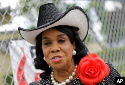 Rep. Frederica Wilson, D-Fla., talks to reporters in Miami Gardens, Fla., Oct. 18, 2017.