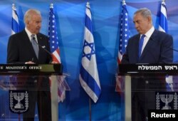 U.S. Vice President Joe Biden (L) and Israeli Prime Minister Benjamin Netanyahu deliver joint statements during their meeting in Jerusalem March 9, 2016.