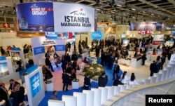 Visitors browse Turkey's stand at the International Tourism Trade Fair (ITB) in Berlin, Germany, March 9, 2016.