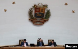 Venezuelan opposition leader and self-proclaimed interim president Juan Guaido attends a session of the Venezuela's National Assembly in Caracas, Jan. 29, 2019.