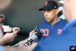 Boston Red Sox manager Alex Cora talks to reporters before a baseball game against the Baltimore Orioles in Baltimore, May 6, 2019.