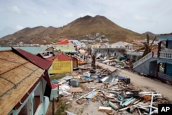 View of the partially buildings destroyed by Irma during the visit of France's President Emmanuel Macron in the French Caribbean islands of St. Martin, Sept. 12, 2017.