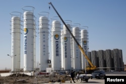 A liquefied natural gas storage facility of the ENN Group Co is under construction in Baoding, Hebei province, China, Dec. 5, 2017.