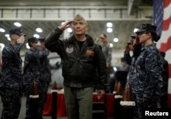 U.S. Navy Admiral Harry Harris, Commander of the U.S. Pacific Command, salutes at a ceremony marking the start of Talisman Saber 2017, a biennial joint military exercise between the United States and Australia, June 29, 2017.