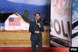 FILE - Wisconsin Gov. Scott Walker speaks to the Republican National Convention, in Cleveland, July 20, 2016.