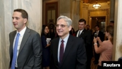 US. Supreme Court nominee Judge Merrick Garland walks after a breakfast with Senate Judiciary Committee Chair Senator Chuck Grassley (R-IA) on Capitol Hill Washington, April 12, 2016.