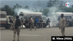 Police fire tear gas to disperse protesters in front of the parliament building in Port au Prince, Haiti, May 30, 2019.