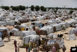 FILE - A photo shows a general view of one of the biggest camps for people displaced by Boko Haram and likeminded Islamist extremists in Maiduguri, Nigeria, Aug. 28, 2016.