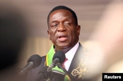 FILE - Emmerson Mnangagwa speaks after being sworn in as Zimbabwe's president in Harare, Zimbabwe, Nov. 24, 2017.