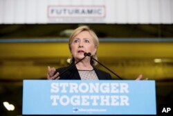 Democratic presidential candidate Hillary Clinton gives a speech on the economy after touring Futuramic Tool & Engineering, in Warren, Mich., Aug. 11, 2016.