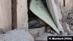 Bodies of IS militants litter the streets and buildings in the areas of Old Mosul recently captured, while the bodies of families are buried in the rubble, June 25, 2017.