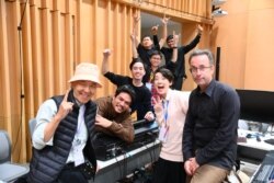 Pongtorn Techaboonakho posed with friends at Princess Galyani Vadhana Institute of Music in Bangkok.