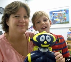 Kevin's mother, Patti Fitzgerald, says her son has made great progress since he began working with Cosmo.