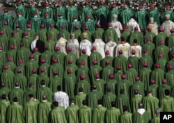 FILE - Bishops and cardinals attend a Mass officiated by Pope Francis at the opening of the Synod of Bishops, in St. Peter's Square of the Vatican, on October 3, 2018. (AP Photo / Alessandra Tarantino)