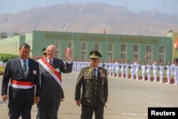 Peruvian President Pedro Pablo Kuczynski attends a ceremony at the air force base in Lima, Peru, Dec. 14, 2017. In a speech at the ceremony, he di not directly address the Odebrecht disclosure about a transfer of $4.8 million to companies linked to him.