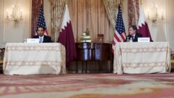 Secretary of State Antony Blinken and Qatar's Foreign Minister Sheikh Mohammed bin Abdulrahman Al Thani hold a news conference following a signing ceremony at the State Department in Washington, Nov. 12, 2021.