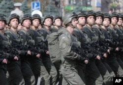 Ukrainian soldiers march down Kyiv's main street during military parade on the 23rd anniversary of Ukraine's Independence, in the capital Kyiv on Aug. 24, 2014